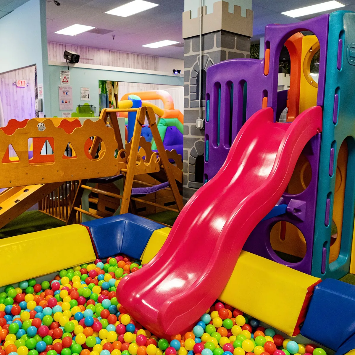 The main play floor at Millie Moo's: slides, climbing structures, and the ball pit