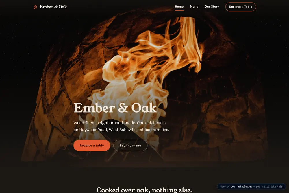 Ember & Oak: dark wood-fired dining shot by firelight with a hand-set menu.